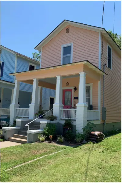 Home exterior before roof replacement